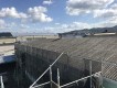 傷んだ工場のスレート屋根